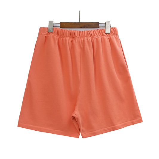 FEAR OF GODS ESSENTIALS BASIC ORANGE SHORT