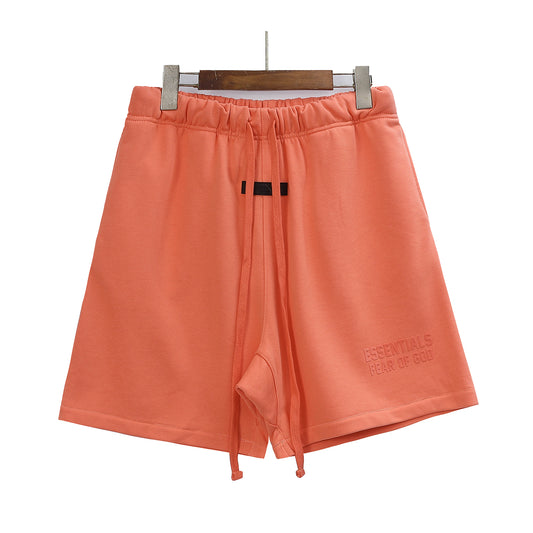 FEAR OF GODS ESSENTIALS BASIC ORANGE SHORT