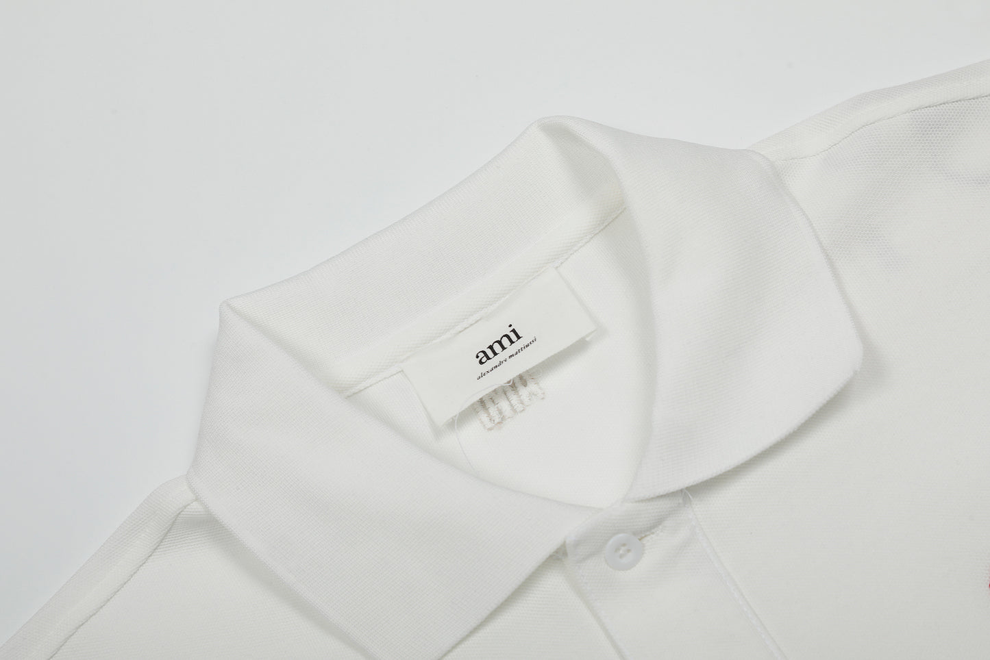 AMI PARIS WHITE AND RED POLO T-SHIRT