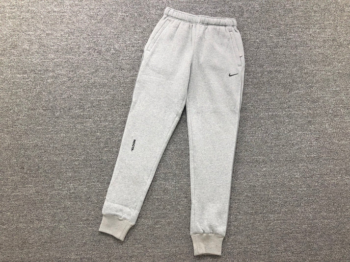 NIKE X DRAKE NOCTA GREY PANTS