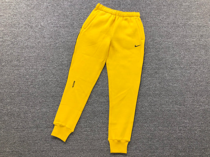 NIKE X DRAKE NOCTA YELLOW PANTS