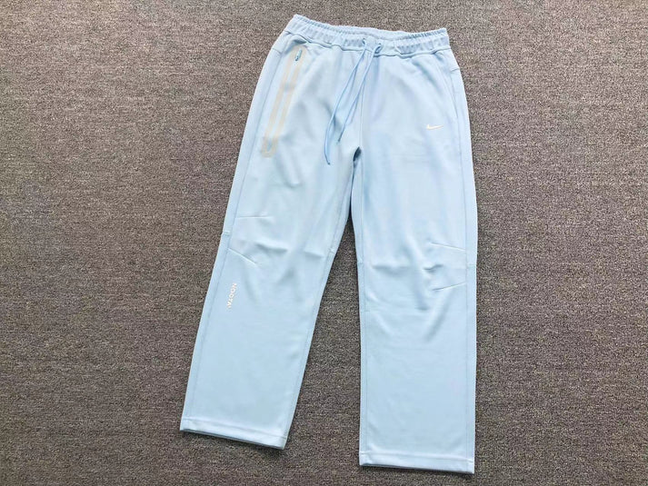 NIKE X NOCTA TECH FLEECE PANTS BABY BLUE
