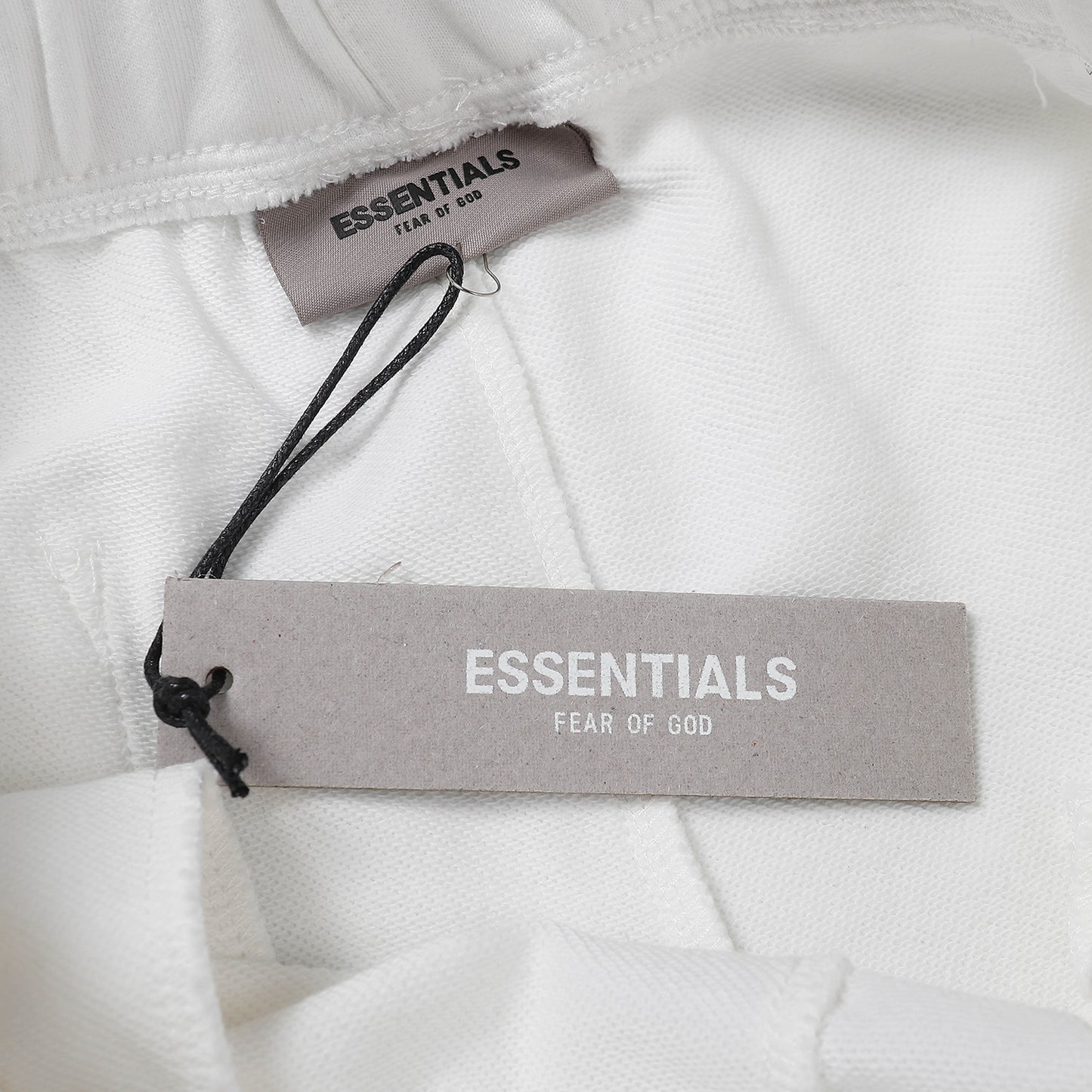 FEAR OF GODS ESSENTIALS WHITE SS20 SHORTS