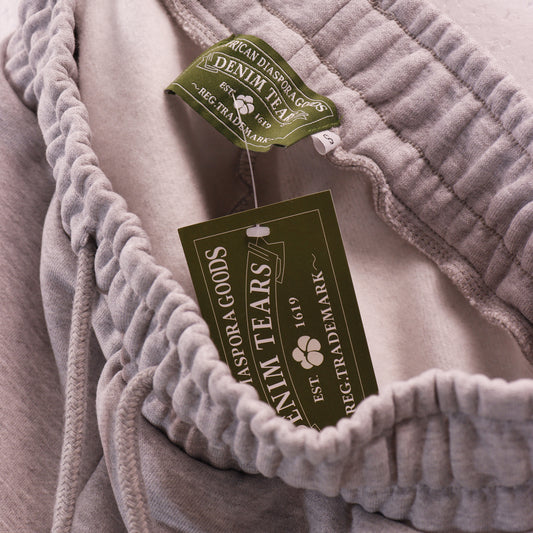 DENIM TEARS GREY SHORTS