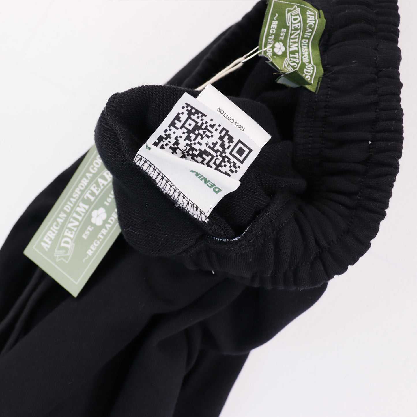 DENIM TEARS BLACK SHORTS BIG COTTON WREATH