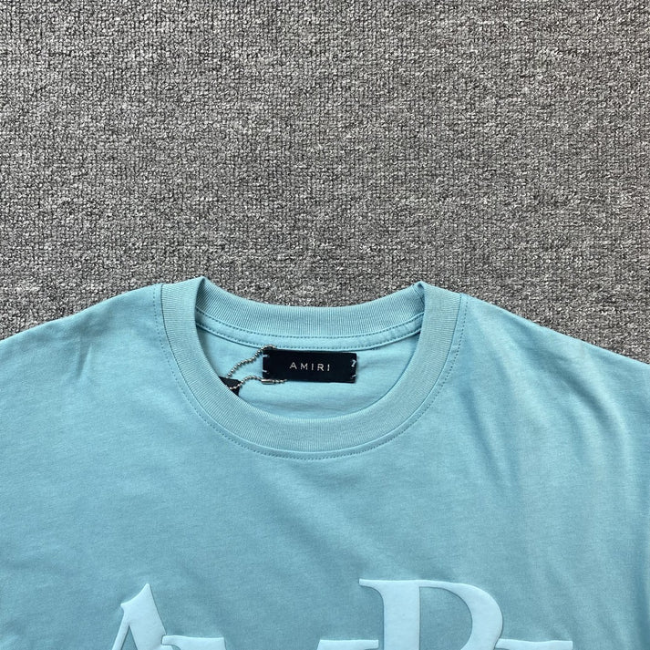AMIRI STRAGGERED LOGO FULL BLUE T-SHIRT