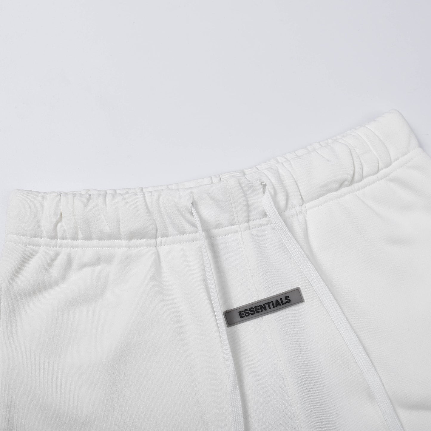 FEAR OF GODS ESSENTIALS WHITE SS20 SHORTS