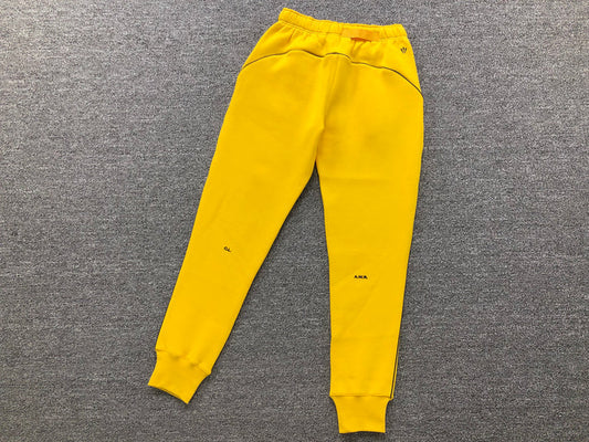 NIKE X DRAKE NOCTA YELLOW PANTS